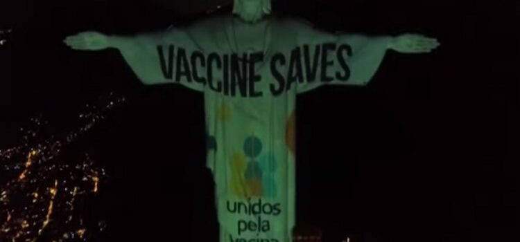 Rio’s Christ the Redeemer defaced by pro-vaccine, pro-abortion group with “Vaccine Saves” slogan in a word play of “Jesus Saves”